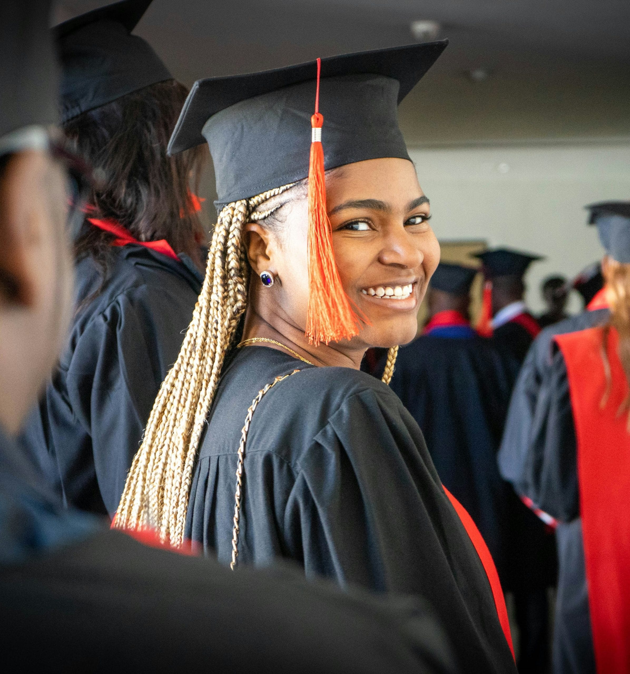 Graduate celebrating academic success with AE CONSULT